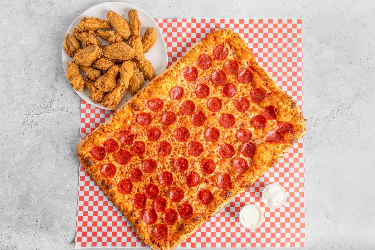 Inferno Pizza slab pizza with wings